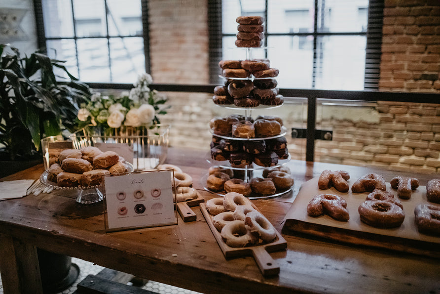 Kate & Rob / Wedding Donuts <br> Photo by: @meghanhemstra